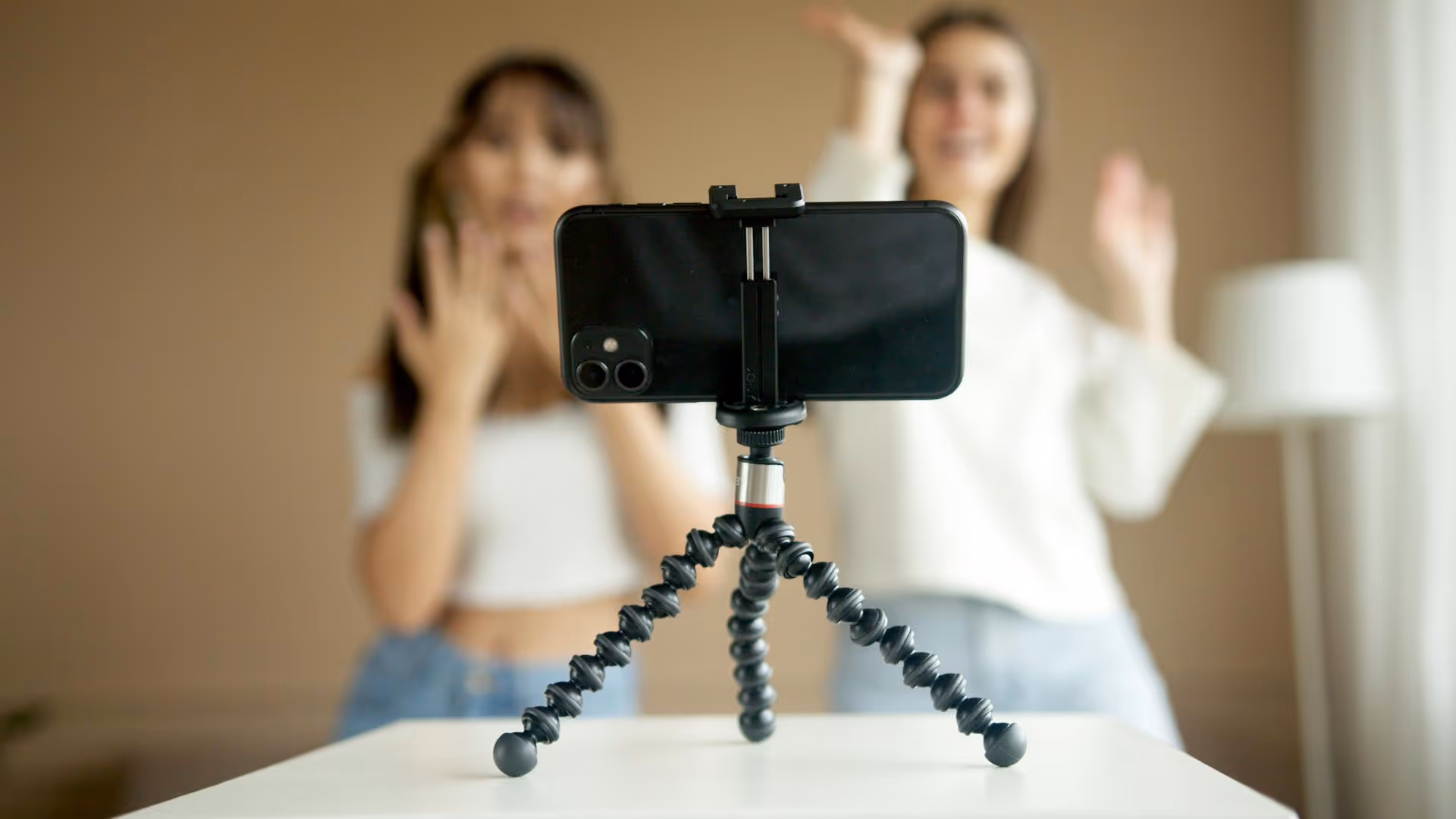 influencers with phone filming on gorrillapod